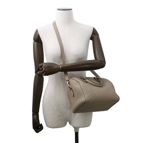 LOUIS VUITTON Speedy Bandouliere Size 25 Monogram Empreinte Leather Tourtere. - Picture 4 of 15